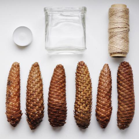Pine cone candle holder.