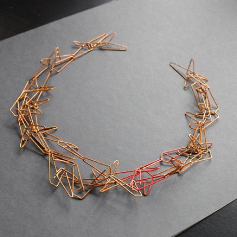 Make a necklace out of paper clips